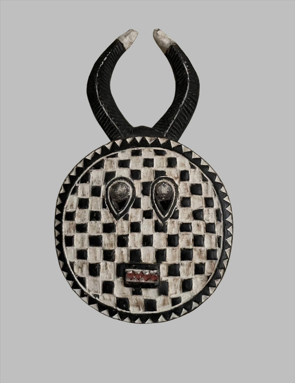 Handcrafted Masks - Artisan Designed - African Art Masks - Handcrafted Traditional - Home Decor - Business - Mask - Artwork - Any Space - African Art Mask - This vintage African Baule Kple Kple mask is hand-carved from wood for a unique home decor piece. The beautiful black and white design is sure to enhance any wall or shelf with its intricate details. Add a statement piece to your living space with this timeless work of art. Length : 19 inches Width: 11 inches