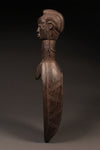 Tribal Objects - African Tribal Art - Ancient Ceremonial Art - Handcrafted Artifacts - Masks - Wood Sculptures - Iron Bronze Objects - Textiles - Art Pieces - African Folk Art - This authentic Ceremonial Ladle Spoon from the Dan Tribe in Liberia, Ivory Coast is carved from wood and features unique figures and artifacts. An ideal piece for collectors, the spoon is a great way to commemorate traditional culture. 22" x 6.25" Inventory # 10308