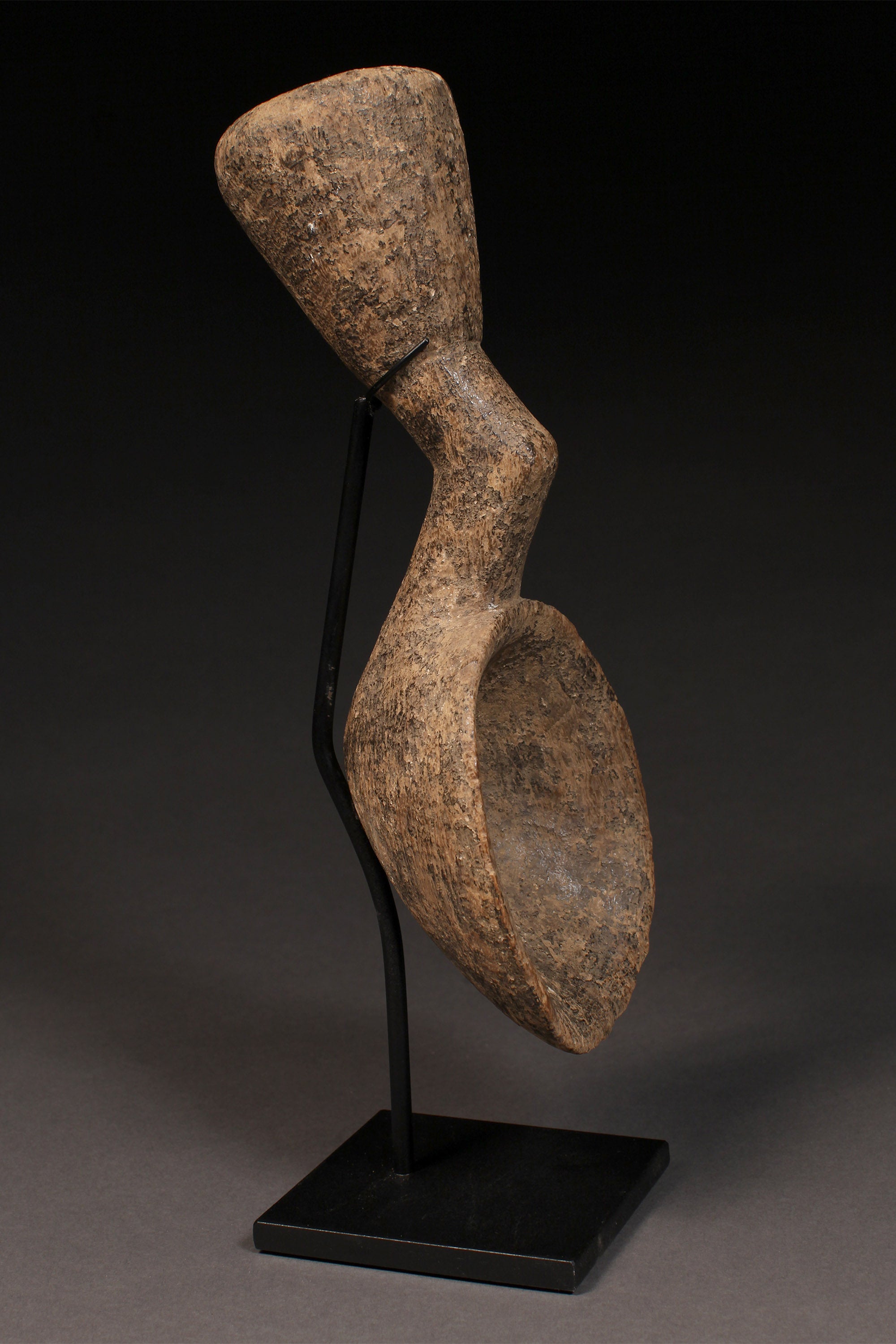 Tribal Objects - This one-of-a-kind Geometric Ceremonial Ladle Spoon is caved from wood by the Kulango Tribe of the Ivory Coast. This unique piece is perfect for bringing an authentic, traditional touch to any home. It can be used as a collectible, decorative object, or even a sculpture. H: 11.5” (13.5