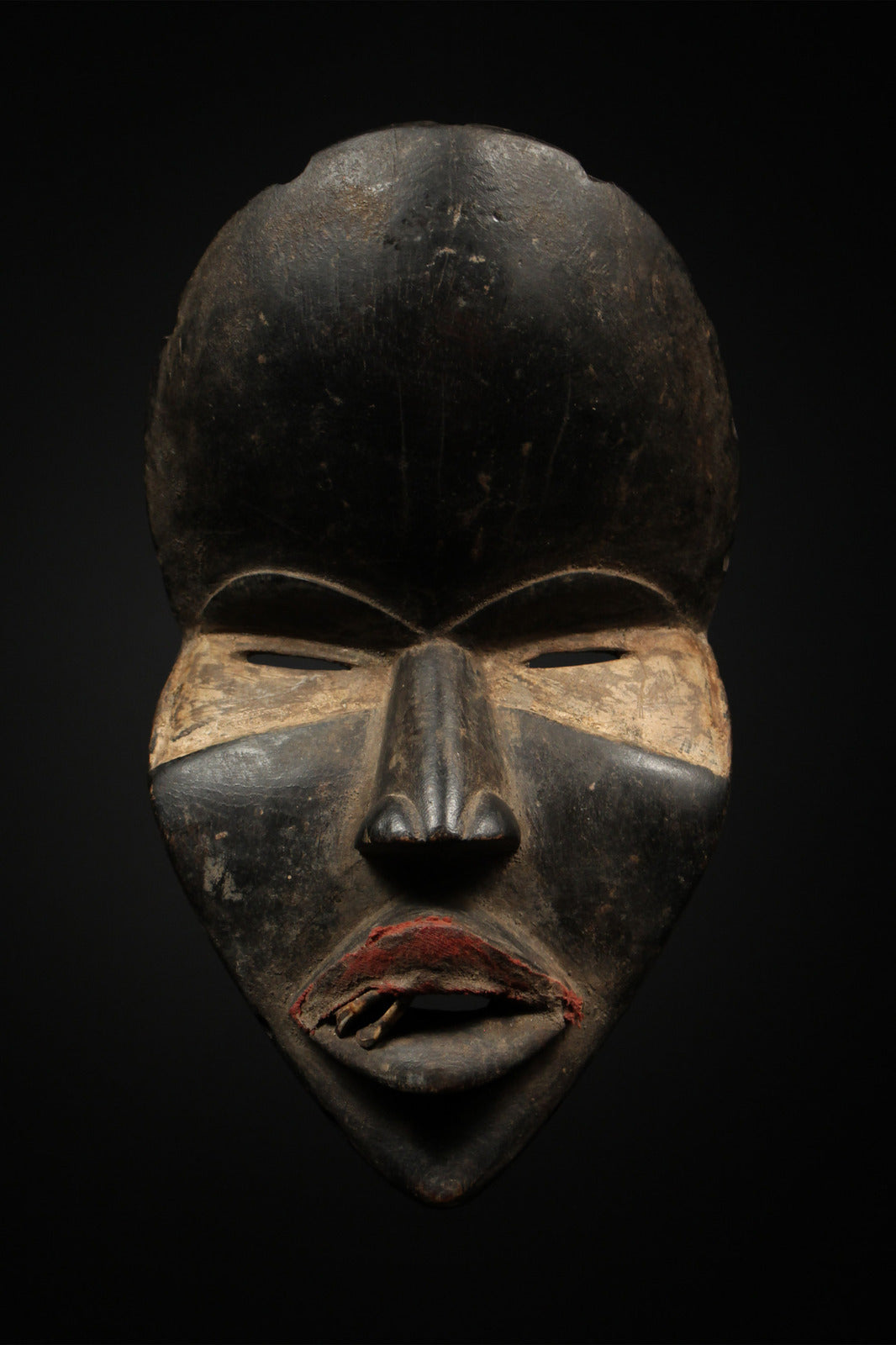 Tribal Masks - Traditional - Folk Art - African - Objects - Artifacts - Sculptures - Collectible - Cultural Sophistication - Home - Intricately - Carved Wooden Deangle Mask - Dan Tribe - Ivory Coast - Handcrafted Wood - Unique Beauty - Decor - Authentic - Statement