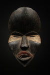 Tribal Masks - Handcrafted - Dan Masks - Traditional Folk Art - African Artifacts Sculptures - African Art Collector - Bring cultural sophistication to your home with this intricately carved wooden Deangle mask, made by the Dan Tribe of the Ivory Coast. Each piece is handcrafted from high-quality wood to showcase its unique beauty. Enhance your decor with an authentic African piece and make a sophisticated statement. H: 10" Inventory # 10799