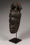 Tribal Masks - Handcrafted - Baule Masks - Traditional Folk Art - African Artifacts Sculptures - African Art Collector - This Kpan mask is a stunning piece of Baule African Art. Expertly carved from wood, it features the iconic elephant design, a perfect addition to any collection. Enjoy this timeless and beautiful artwork. Length: 12.5 inches * Item sells with custom stand*