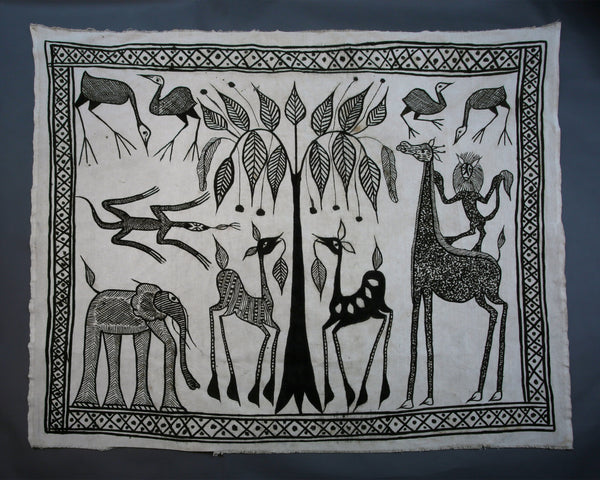 Handcrafted Textiles - African Art - Mudcloth Textiles - Traditional Designs - Home Decor - Living Spaces - 64" X 52 " Inventory # 10811 This Senufo cotton fabric is the perfect addition to any home or living space. It is hand painted, dyed black and white, and features beautiful mudcloth designs. The breathable cotton material makes it ideal for a variety of textile designs.