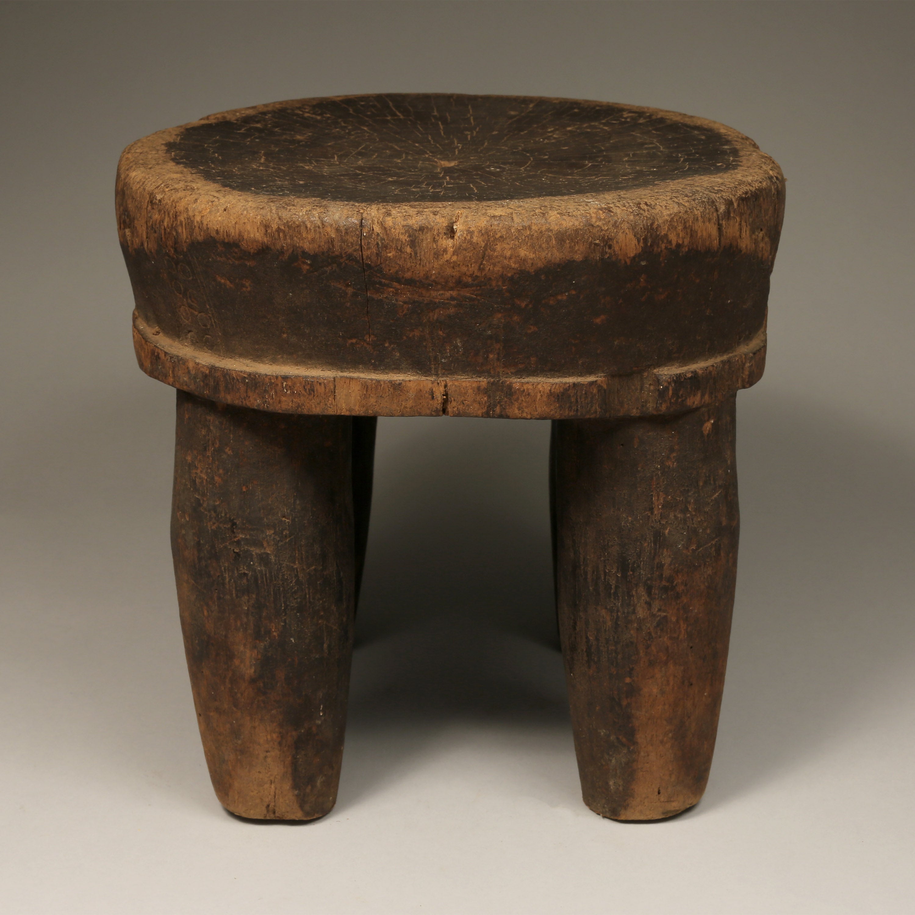Tribal Furniture - African Art - Home Decor - African Stools - Chairs - Traditional Furniture - Collectible Art - This unique Old Low Stool is crafted from wood originating from the Senufo Tribe of the Ivory Coast. It is an authentic, handmade piece of cultural history, and will become a treasured addition to any home. Height: 10