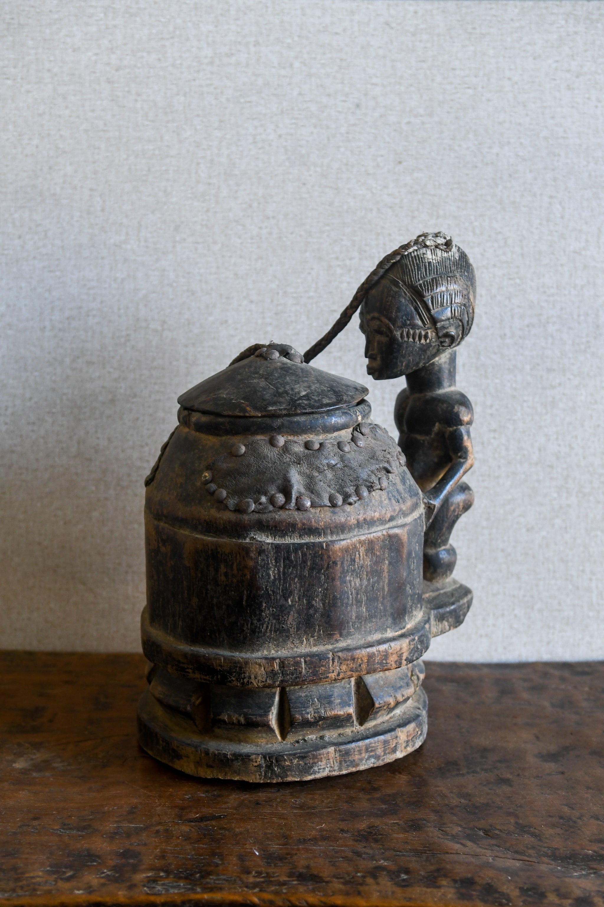 Tribal Objects - African Tribal Art - Ancient Ceremonial Art - Handcrafted Artifacts - Masks - Wood Sculptures - Iron Bronze Objects - Textiles - Art Pieces - African Folk Art - This unique Baule Divination Bowl Figure is an authentic piece of African art. It is an old carved wooden figure, crafted by highly skilled artisans, and is sure to make a statement in any space. The Divination Lidded Vessel Bowl is a perfect addition to any collection of sculptures and objects.Height : 15 inchesDepth: 4 inches