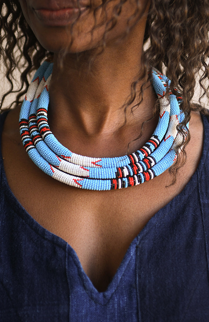 Handcrafted Necklaces - Handmade - African Art - Jewelry - Beaded Necklaces - This Collar Beaded Necklace is handmade from Africa and features an intricate beaded design. This piece is sure to elevate your wardrobe with its elegant and timeless craftsmanship. Perfect for any occasion, it will be sure to get compliments wherever you go. Length: 9