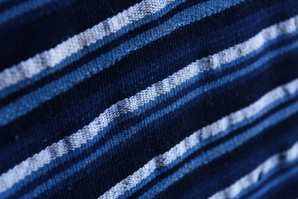 Handcrafted Textiles - Artisan Designed - Handcrafted African Art Textiles - Home Decor - Living Spaces - Mix Colors - Bold Patterns - Traditional Designs - African Culture - This African indigo home decor fabric features a striking Blue White Striped pattern, crafted from a vintage cotton textile. Length: 51 inch