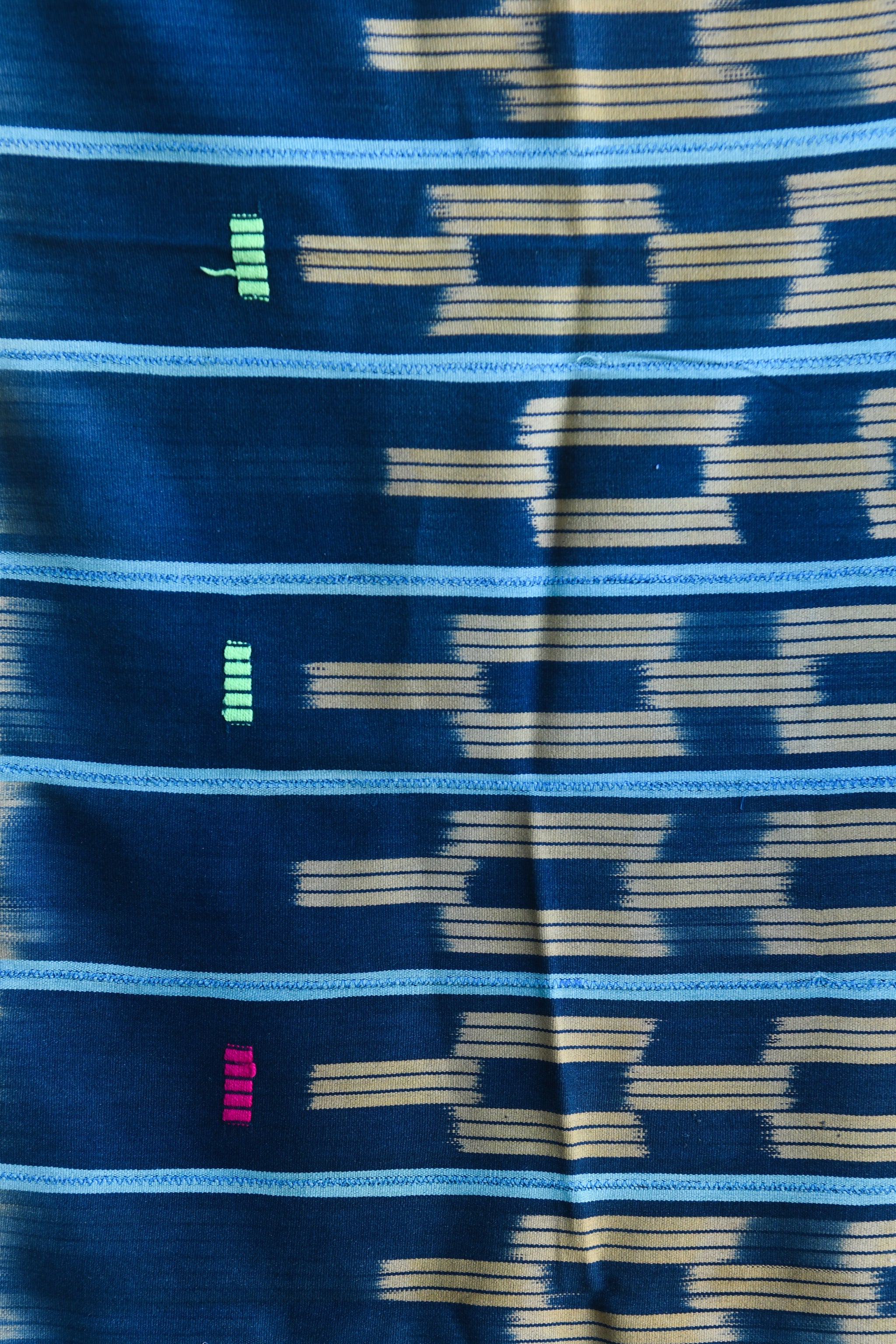 Handcrafted Textiles - Artisan Designed - Handcrafted African Art Textiles - Home Decor - Living Spaces - Mix Colors - Bold Patterns - Traditional Designs - African Culture - This Indigo Tie Dyed Ikat Fabric is crafted from an African cotton textile, inspired by a vintage Baule design. Length: 55 inches Width: 41 inches