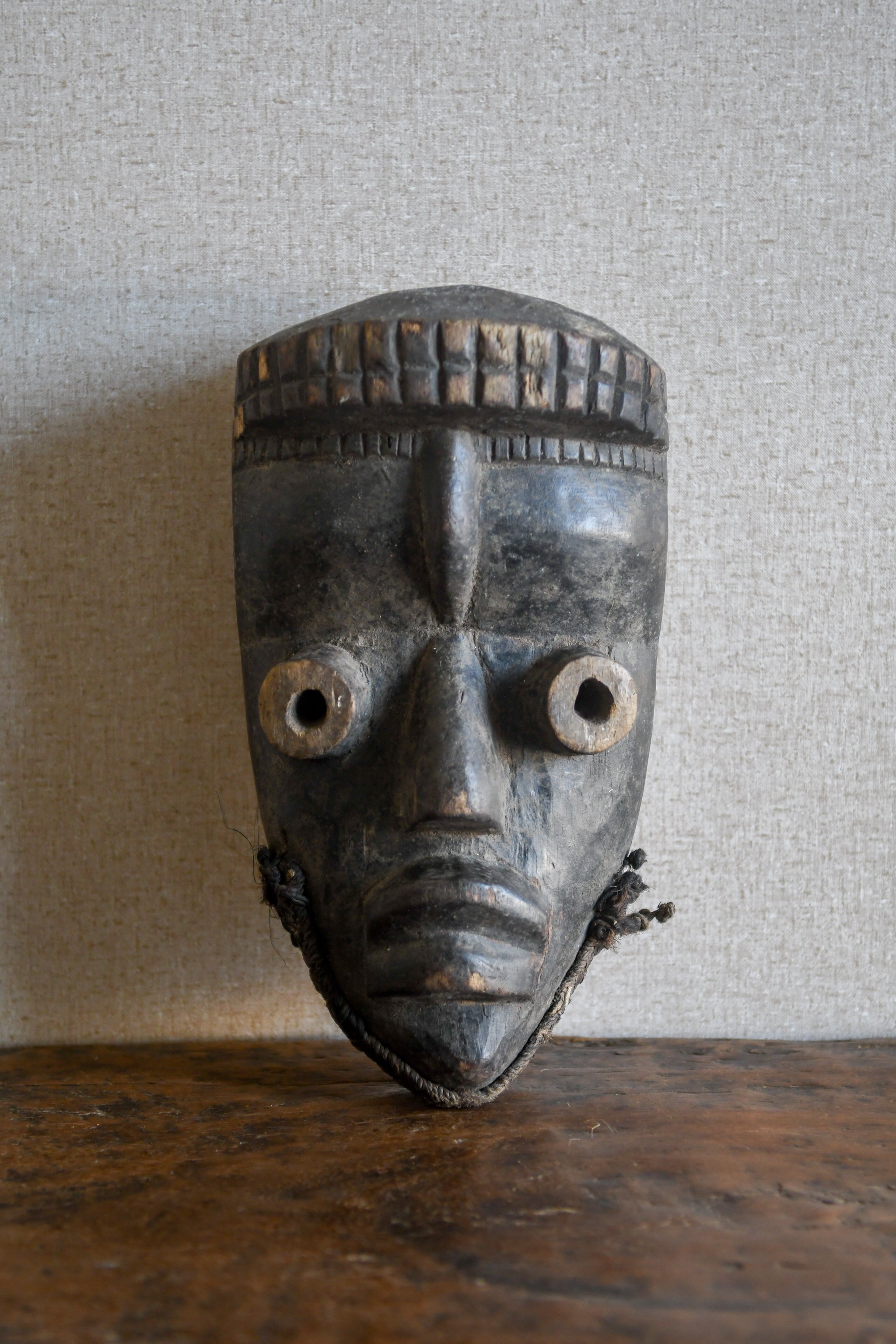 Tribal Masks - Handcrafted - Bete Masks - Traditional Folk Art - African Artifacts Sculptures - African Art Collector - This Bete Kran Mask, Wood, is hand-carved by artisans from Ivory Coast. It is intricately detailed, with a realistic, textured finish. Ideal for collectors or as a stand-out statement piece, this mask is an exquisite example of African artistry.