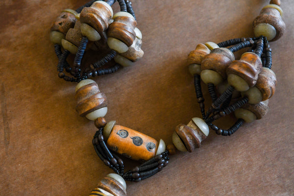 Tribal Necklaces - Handmade - African Art - Jewelry - Traditional - African Necklaces - Beaded - Collectible Necklaces - This huge and rare tribal necklace features Carved Bone African Art and is great for home decorations and collections. It stands out with its bold design and intricate detail. Length: 33 inches