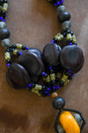 Tribal Necklaces - Handmade - African Art - Jewelry - Traditional - African Necklaces - Beaded - Collectible Necklaces - This Carved Resin Tribal Necklace is sure to make a statement. Rare and collectible African trade beads are intricately woven together in an eye-catching design, making this necklace hugely unique. Perfect for tribal decor enthusiasts. Length: 27 inches