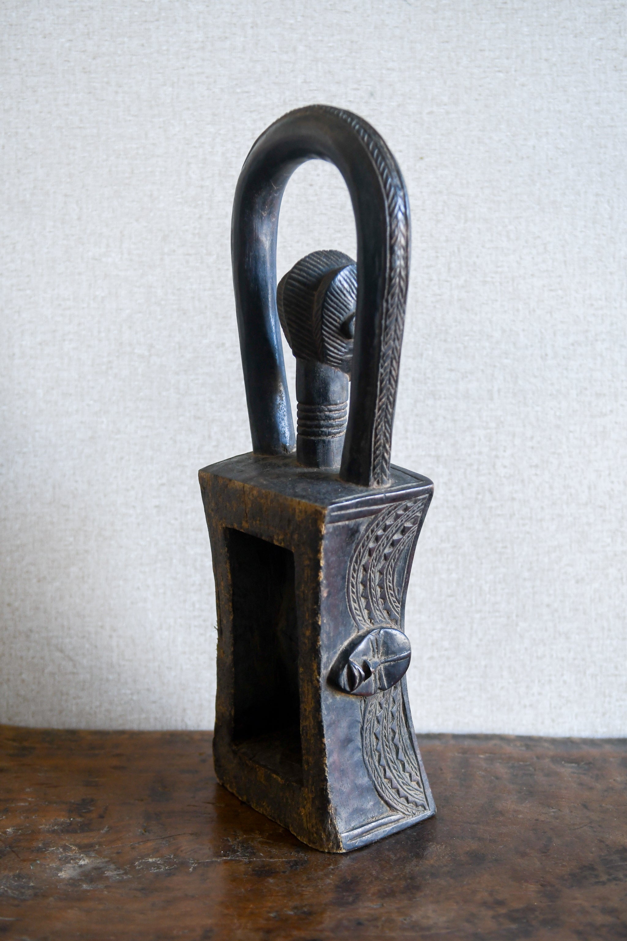 Tribal Objects - African Tribal Art - Ancient Ceremonial Art - Handcrafted Artifacts - Masks - Wood Sculptures - Iron Bronze Objects - Textiles - Art Pieces - African Folk Art - This Dan Figure Headrest Masks Sculpture makes a unique addition to any collection. Carved from carved wooden tribal objects, it features precise details that make it a truly captivating piece. Perfect for displaying in any home or office, this collectible sculpture adds a touch of African cultural heritage to any space.