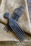 Tribal Objects - African Tribal Art - Ancient Ceremonial Art - Handcrafted Artifacts - Masks - Wood Sculptures - Iron Bronze Objects - Textiles - Art Pieces - African Folk Art - A Pair of Ashanti Combs, expertly carved from precious wood, make beautiful artifacts and African tribal art objects. These old combs showcase an intricate design; perfect for collectors and admirers of African culture. Length: 9 inches