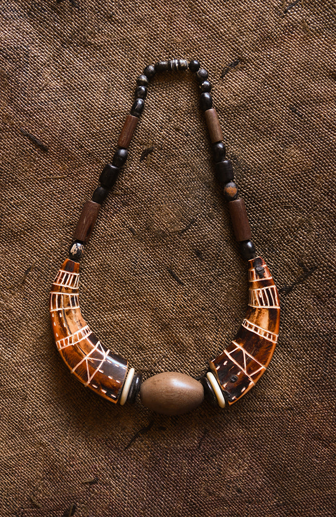 Handcrafted Necklaces - Handmade - African Art - Jewelry - Beaded Necklaces - This African Tribal Collar Jewelry is handcrafted from genuine bone beads, creating a distinctive piece that looks great with any outfit. Its unique tribal design makes it a one-of-a-kind accessory for any fashionista. Length: 9.5