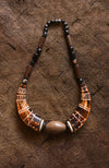 Handcrafted Necklaces - Handmade - African Art - Jewelry - Beaded Necklaces - This African Tribal Collar Jewelry is handcrafted from genuine bone beads, creating a distinctive piece that looks great with any outfit. Its unique tribal design makes it a one-of-a-kind accessory for any fashionista. Length: 9.5" Inventory # 10832
