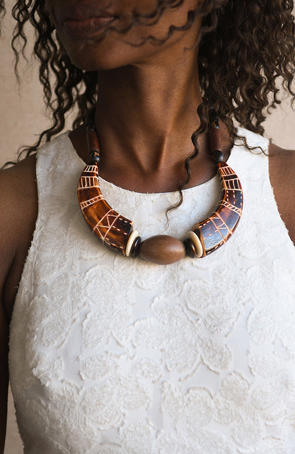 Handcrafted Necklaces - Handmade - African Art - Jewelry - Beaded Necklaces - This African Tribal Collar Jewelry is handcrafted from genuine bone beads, creating a distinctive piece that looks great with any outfit. Its unique tribal design makes it a one-of-a-kind accessory for any fashionista. Length: 9.5" Inventory # 10832