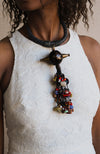 Handcrafted Necklaces - Handmade - African Art - Jewelry - Beaded Necklaces - This handmade Statement Tribal Jewelry Necklace features a traditional Trade Beads Pendant from Africa. An eye-catching piece with a timeless look.