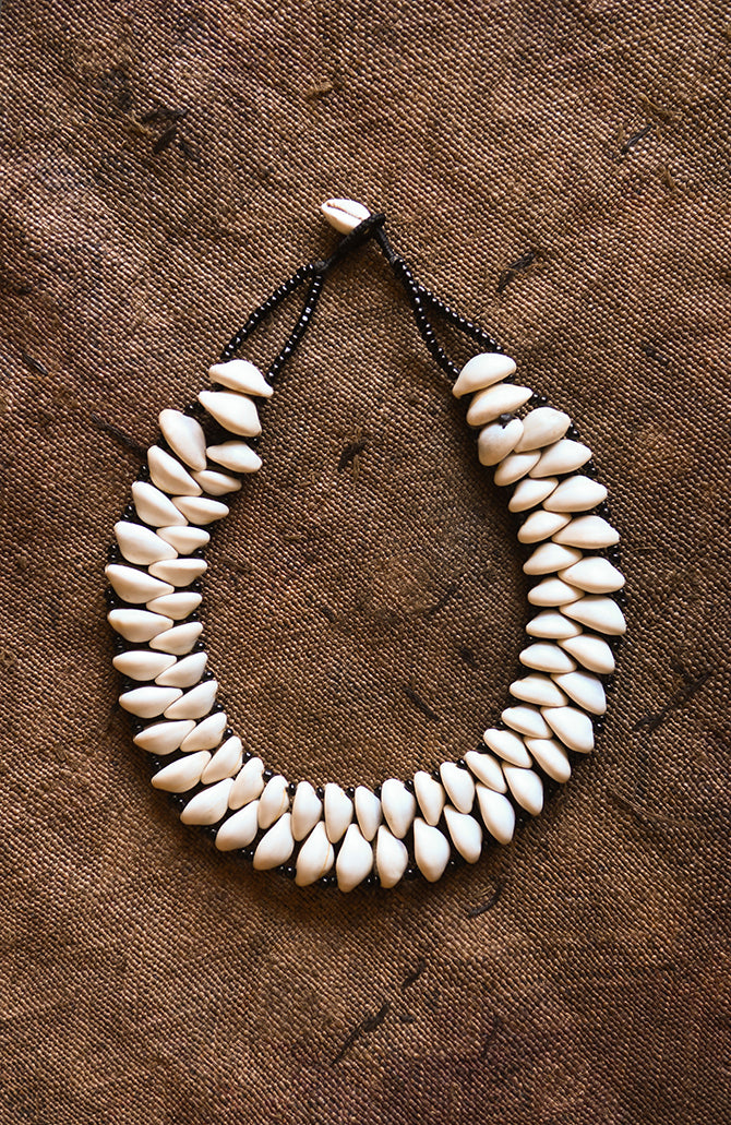 Handcrafted Necklaces - Handmade - African Art - Jewelry - Beaded Necklaces - This African Collar Cowrie Shell Jewelry is a beautiful statement necklace, handmade with authentic cowrie shells. It's a perfect accessory to take any outfit from simple to stunning. Add a touch of elegance to your wardrobe with this unique statement piece. Length: 9