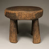 Tribal Furniture - A unique piece of art, this Old Senufo Wood Stool is a stunning example of traditional Ivory Coast craftsmanship. Boasting intricate geometric carvings, this stool is sure to be a conversation starter.