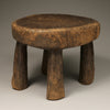 Tribal Furniture - A unique piece of art, this Old Senufo Wood Stool is a stunning example of traditional Ivory Coast craftsmanship. Boasting intricate geometric carvings, this stool is sure to be a conversation starter.